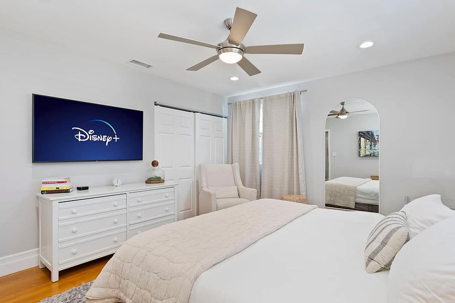 Relax in bed or enjoy your favorite shows on the Smart TV from the comfort of this bright and peaceful bedroom.