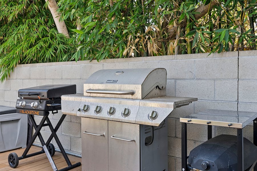 Outdoor BBQ Station
Make the most of outdoor dining with a gas grill, Blackstone griddle, prep station, and spacious deck area.