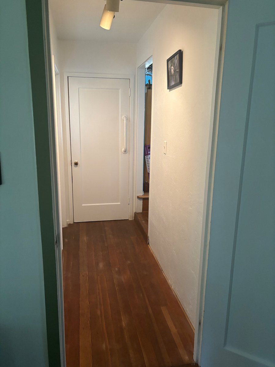 private hall leading to bathroom
