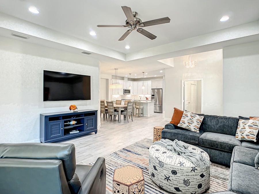 Open Concept: View of Great Room, Dining Room, & Kitchen from Lanai entrance.