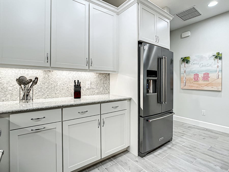 Kitchenaid refrigerator with freezer in bottom drawer.