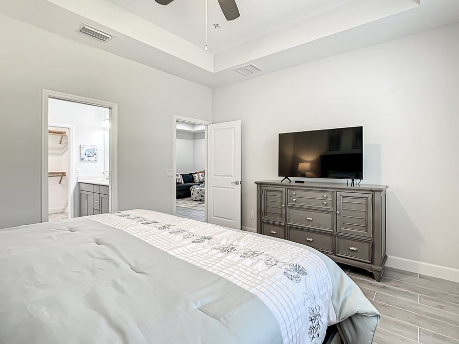 Owner's suite matching dresser with Samsung 50" Smart TV.