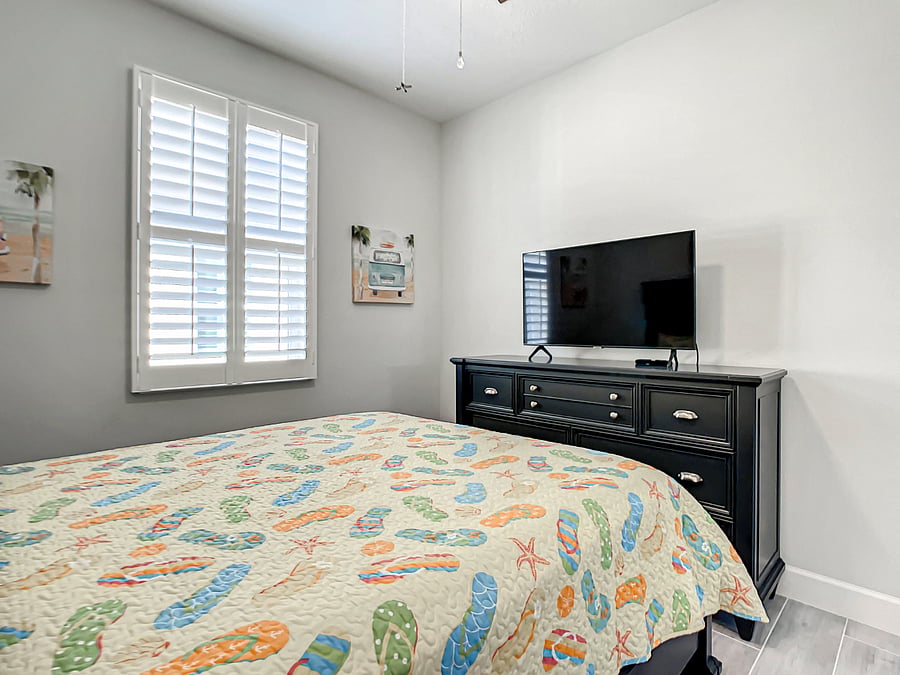 Guest bedroom matching dresser with Samsung 43" Smart TV.