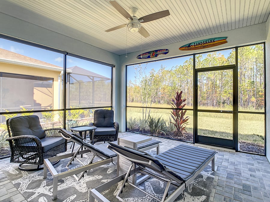 Padded lounge chairs give you the perfect place to watch the sunrise through the trees.