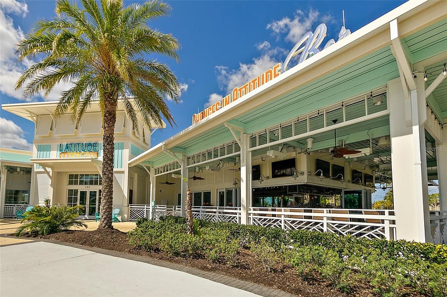 Latitude Bar & Chill (bar & restaurant) at Town Center adjacent to the resort-style pool