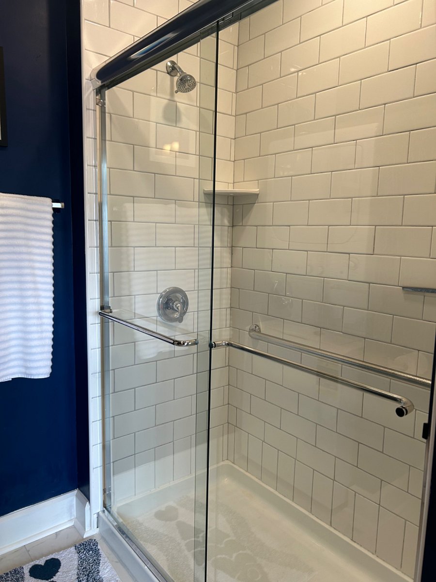 All tile to the ceiling (10 feet!) in this new shower