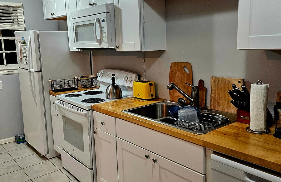 Kitchen with stove, microwave, dishwasher, fridge, etc.