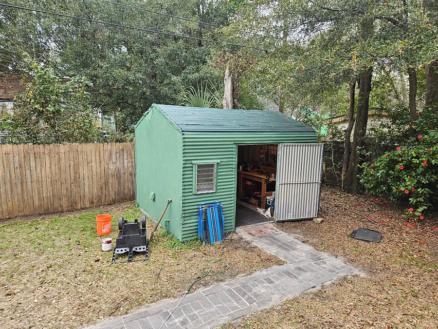 Shed with new washer and dryer, workbench and tools
