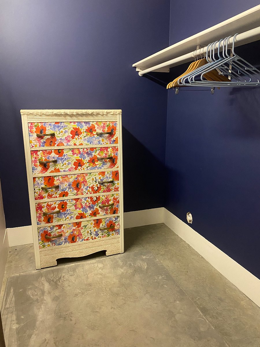 Full dresser and space to hang clothing