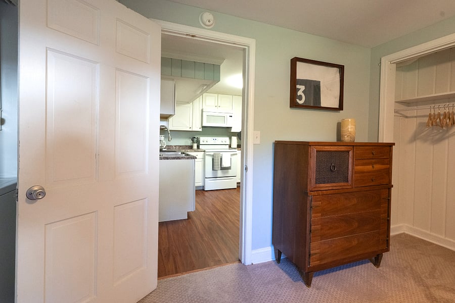 Bedroom includes closet and dresser for plenty of storage