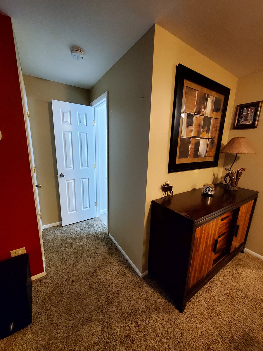 Entry to Downstairs bathroom and closet for storage.