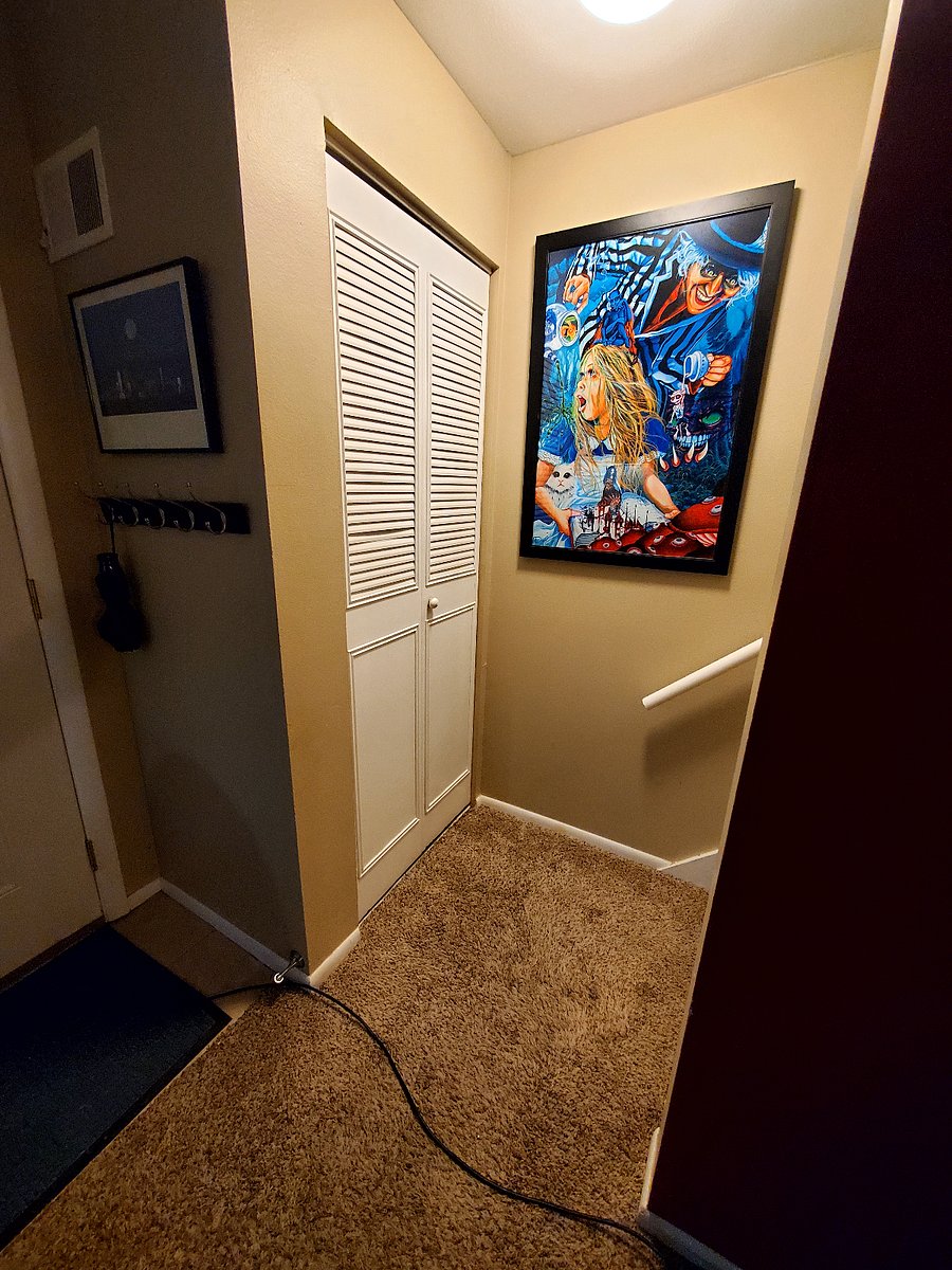 Entry upstairs with closet for storage. 