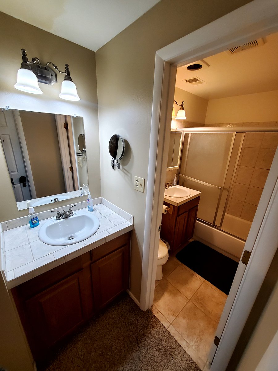 Separated sink to bathroom configuration.  