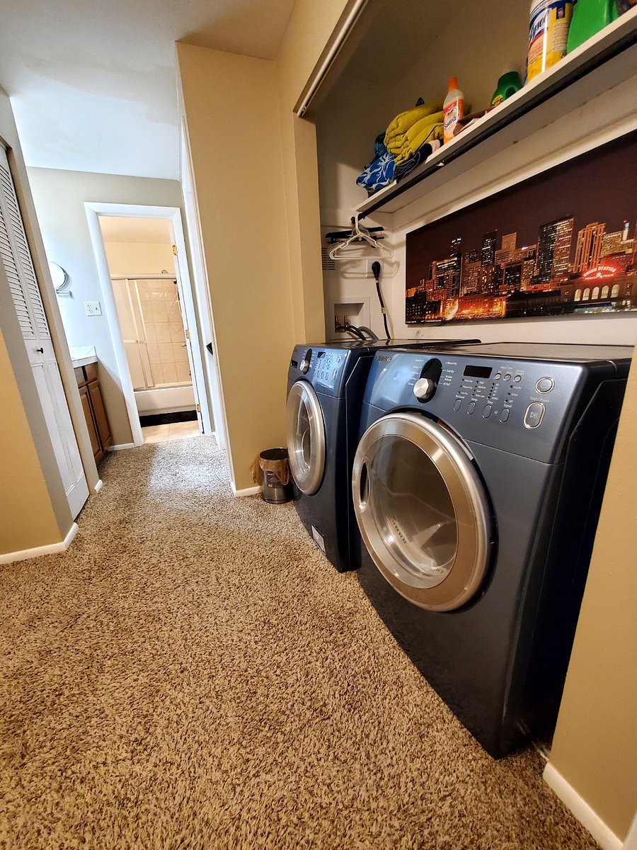 Laundry area into entry to upstairs bathroom.