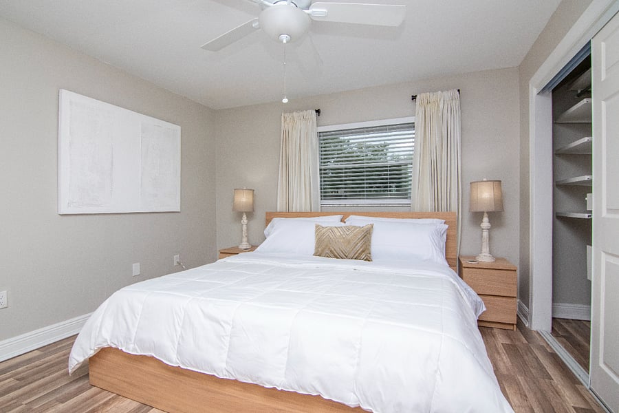 Master Bedroom w/ King Size Bed, Smart TV, and Custom Closet System