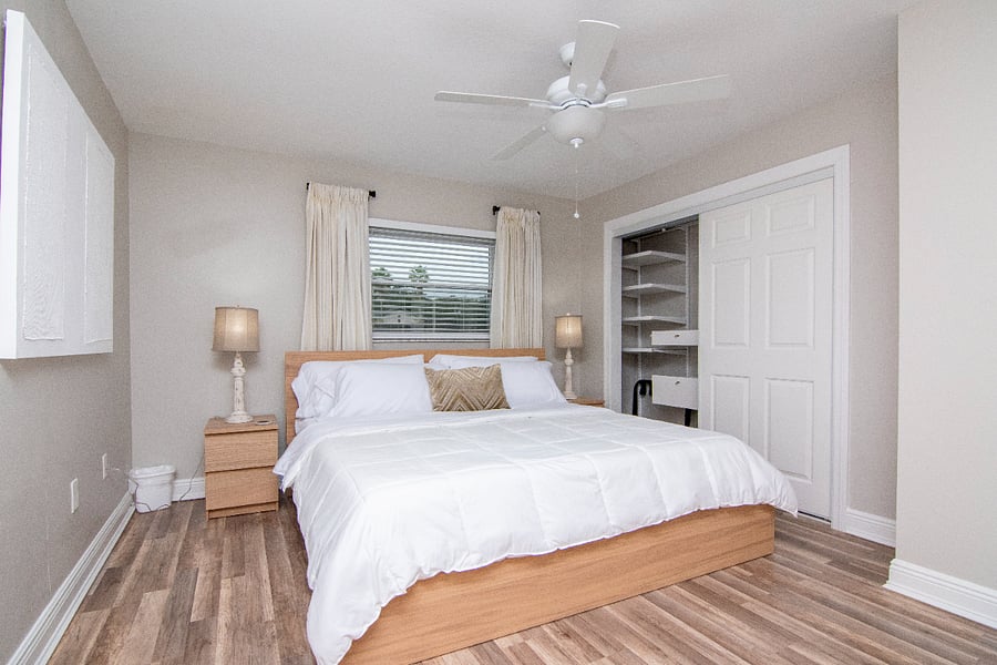 Master Bedroom w/ King Size Bed, Smart TV, and Custom Closet System