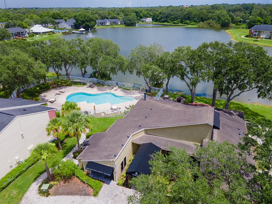 Community Clubhouse w/ Salt Water Pool, Fitness Center overlooking lake, and Gazebo.