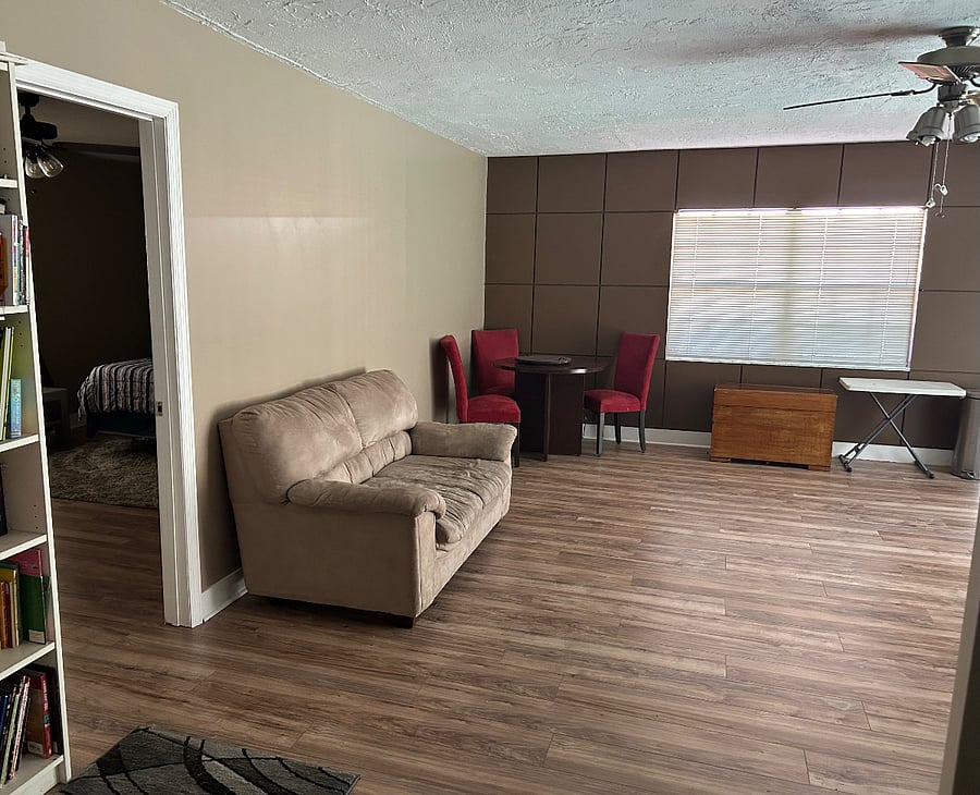 Showing your bedroom connected to your living room space. 