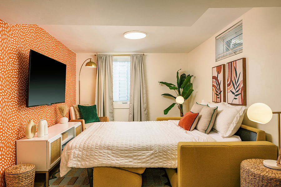 converted sofa-bed with black-out curtains