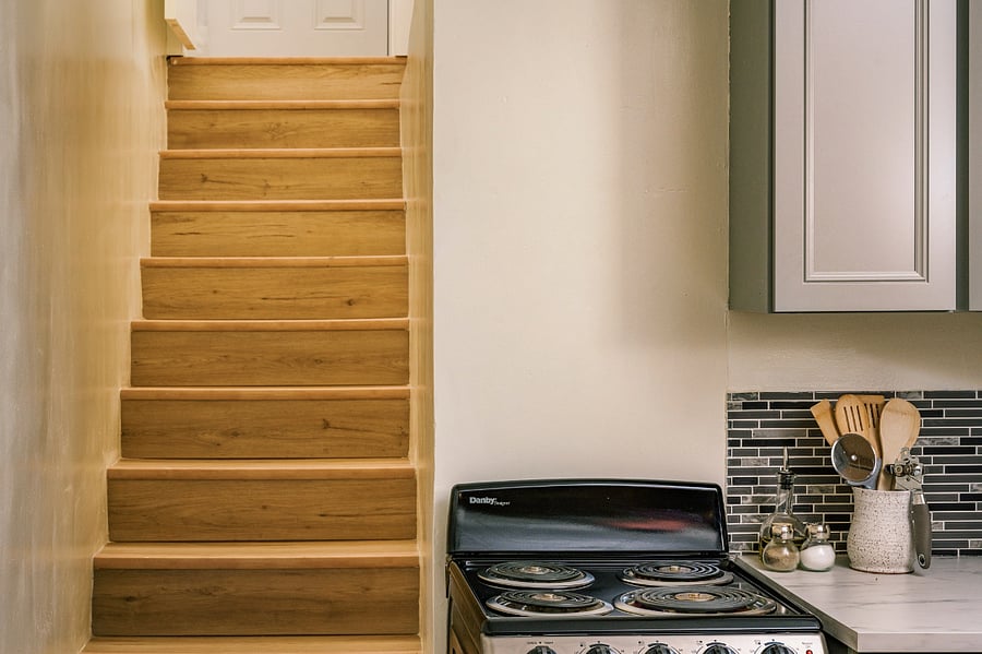 Stairs lead to entrance of unit