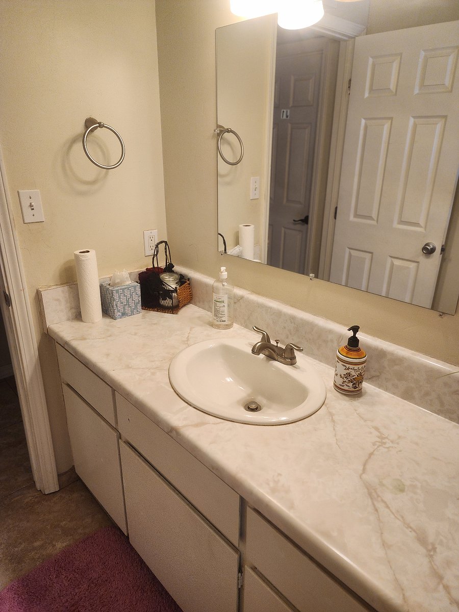 Basin & counter with hand sanitizer,  paper towels,  liquid soap (all provided), and extra wash clothes if needed. 