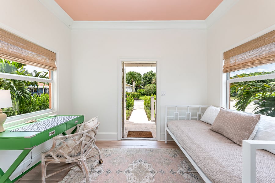 Entry features dedicated workspace with desk and chair plus bonus twin bed
