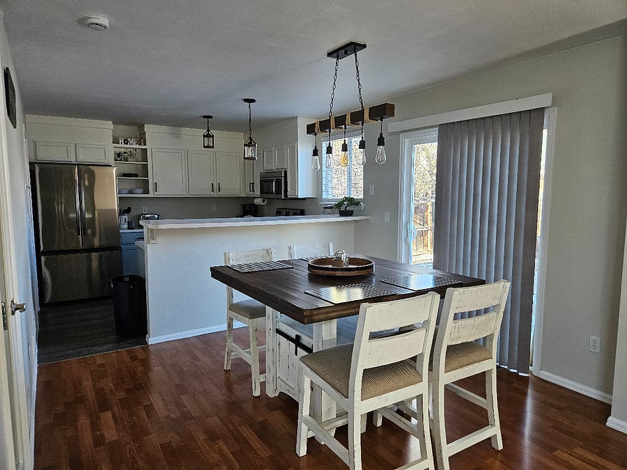 Dining area with table and 4 chairs