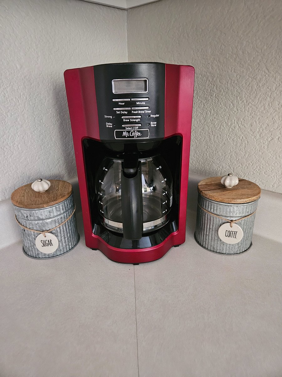 Coffee maker with starter sugar and coffee provided.