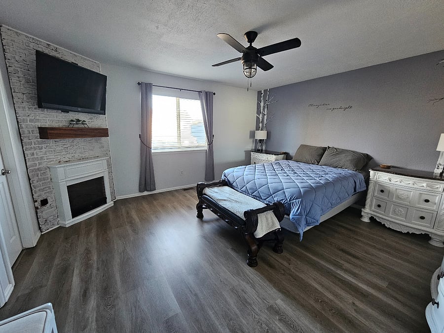 Master bedroom with queen bed, walk-in closet, on-suite bath and smart TV