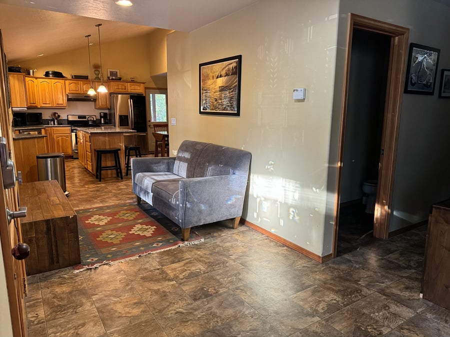 Entry way, Kitchen on left bathroom door on right