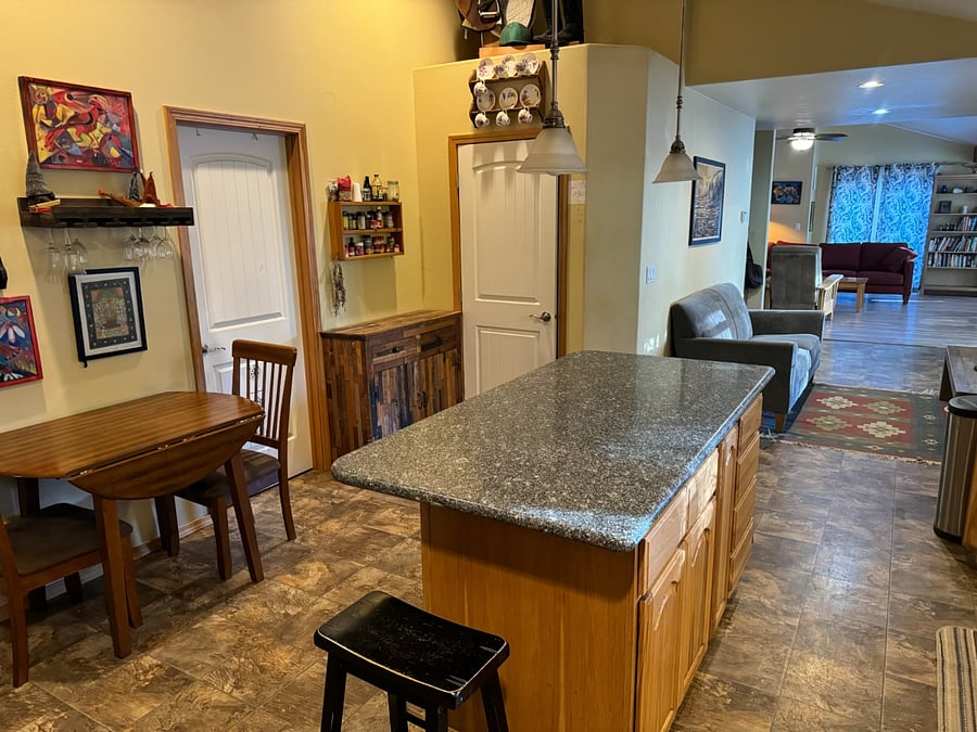 Kitchen with additional eating area.