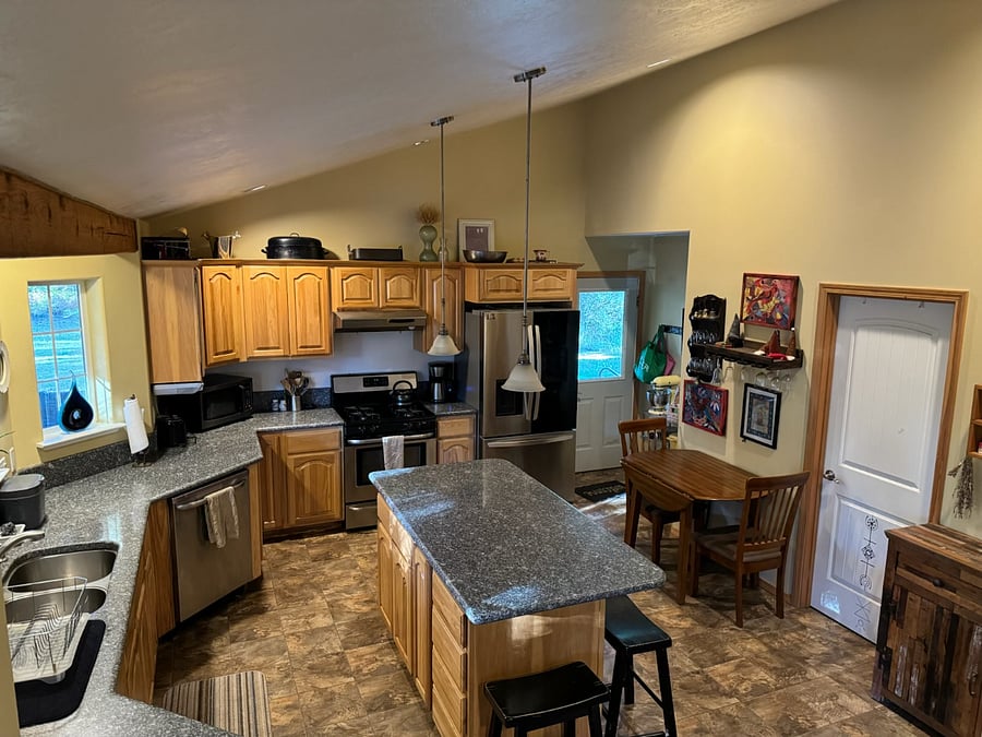 Kitchen with door to Bedroom 3