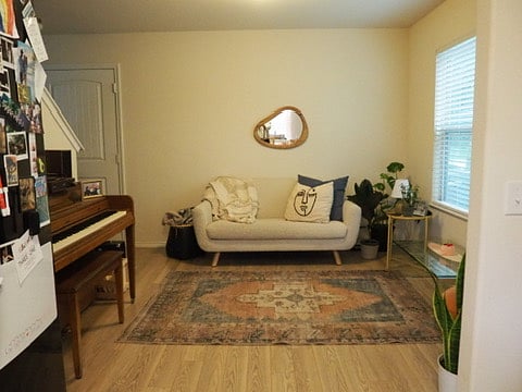 The kitchen leads to the second family living space on the main floor.
