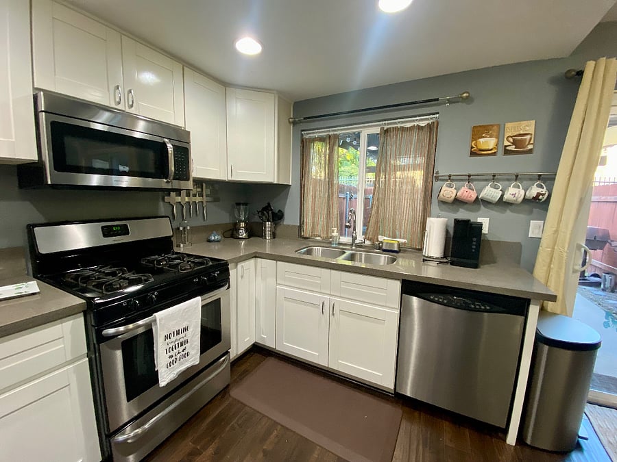 Coffee station, other small appliances including Keurig, electric tea kettle, Insta-Pot, blender and toaster. Dinnerware and utensils provided.