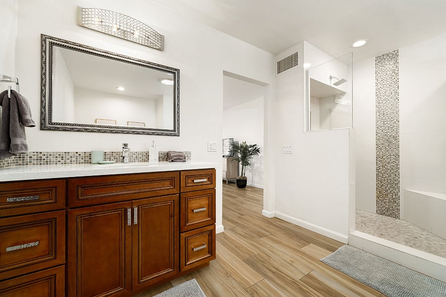 Master bathroom with renovated shower and floor to ceiling tile work