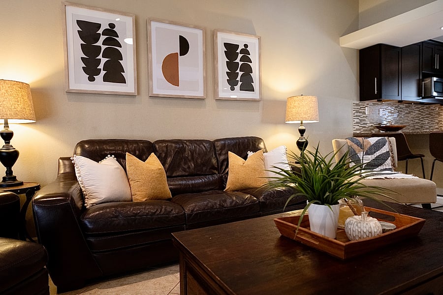 Plush leather couch with new pillows