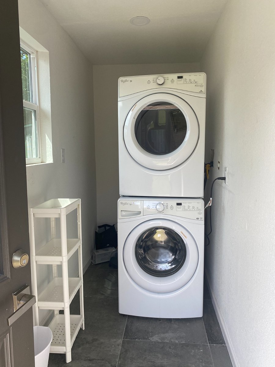 Shared laundry room with downstairs tenant.