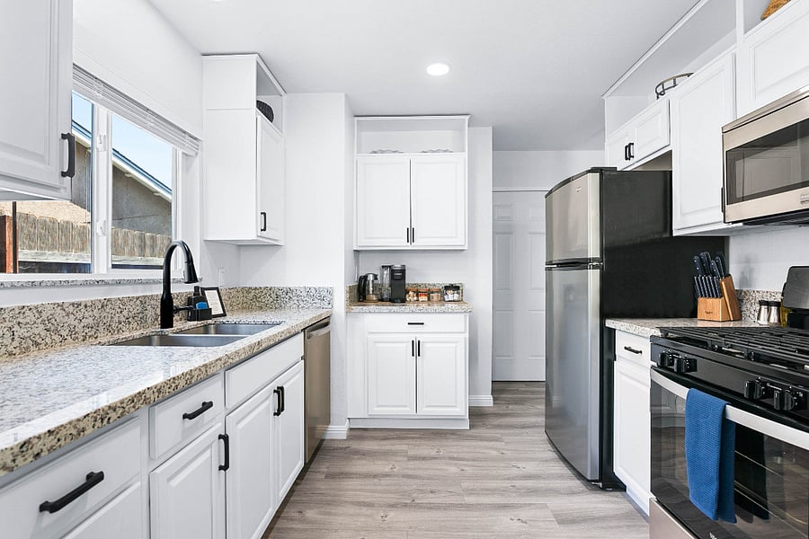 Fully stocked kitchen including pots/pans, bake ware, knives, cooking utensils, stemware, glasses/mugs, flatware, ceramic plates/bowls, plastic plates/bowls/cups. Coffee bar with coffee, tea, sugar and cream. Olive oil, salt, and pepper provided.