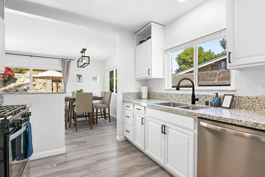 Kitchen items also include toaster, mixing bowls, storage containers, rice cooker, food processor/juicer/blender. Serving bowls, plates, charcuterie boards also provided.
