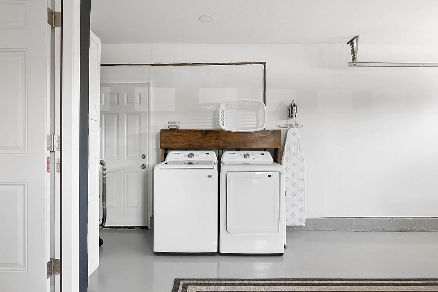 Full sized, brand new, washer and dryer located in garage. Starter pack of laundry soap provided. Iron and ironing board also provided.