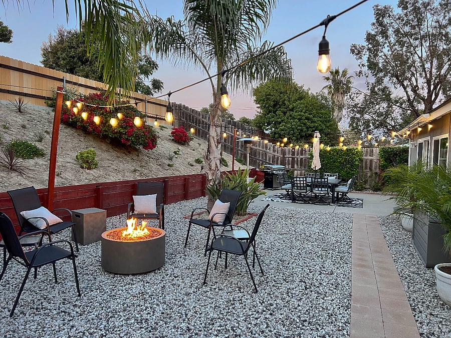 Unwind after a long day in our amazing backyard during sunset with plenty of night light, gas fire pit, and outdoor heating lamp.