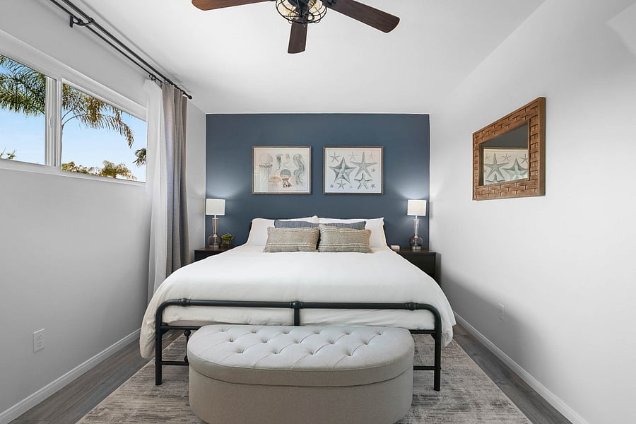 Bedroom also includes night stands with additional storage and electronic charging dock. Window faces the street which allows for a cool ocean breeze to fill the room!