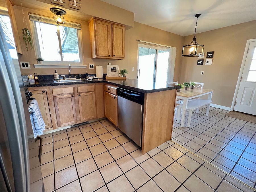 Kitchen is fully stocked and comes with microwave, stove/oven, full size fridge/freezer, dishwasher