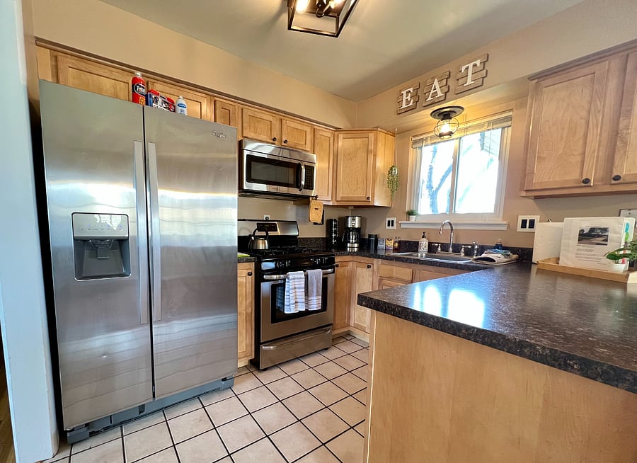 Kitchen features Cuisinart coffee maker