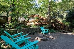 Looking from the yard, over by the cottage, toward the street. The foot bridge- side view