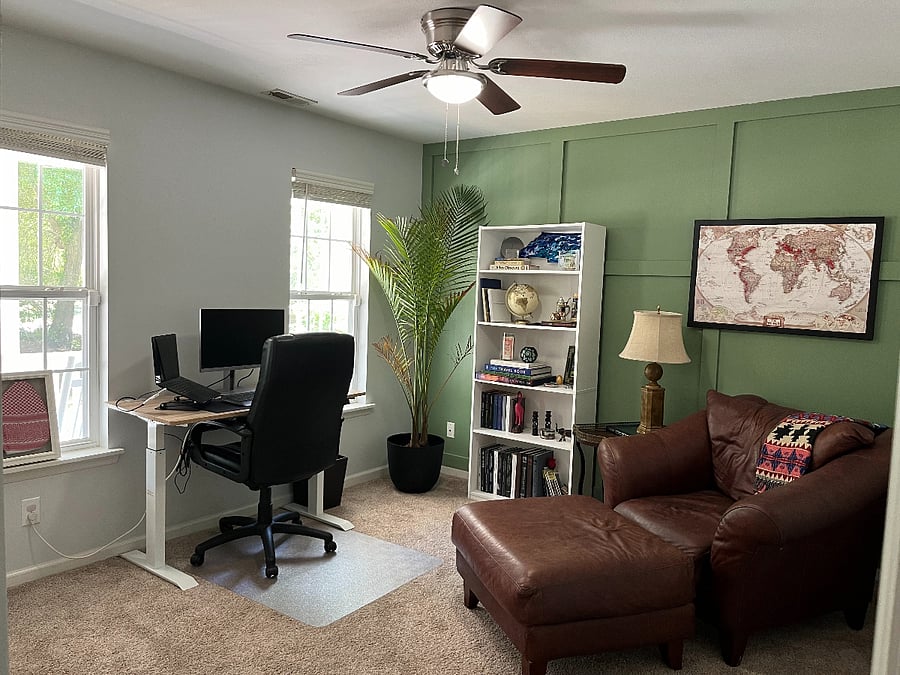Full office with standing desk and comfy reading chair!