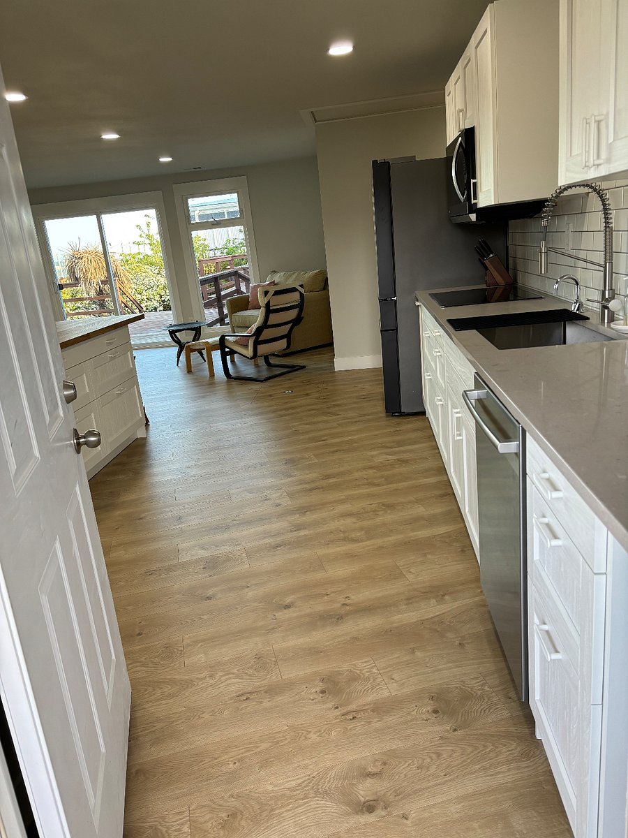 Main entrance leads you into the kitchen, and your are greeted by natural light.