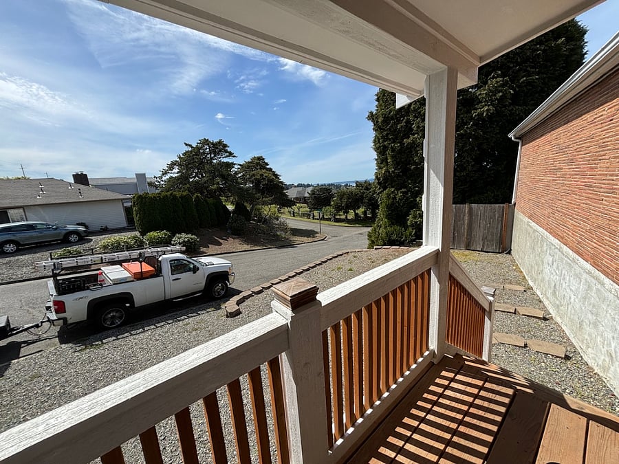 You walk up four steps to reach entry door. You have a porch at the entrance.