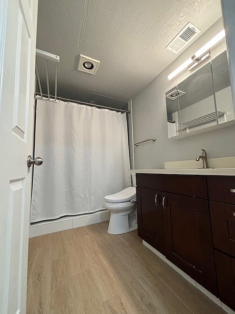 Bathroom has a very large step in shower.