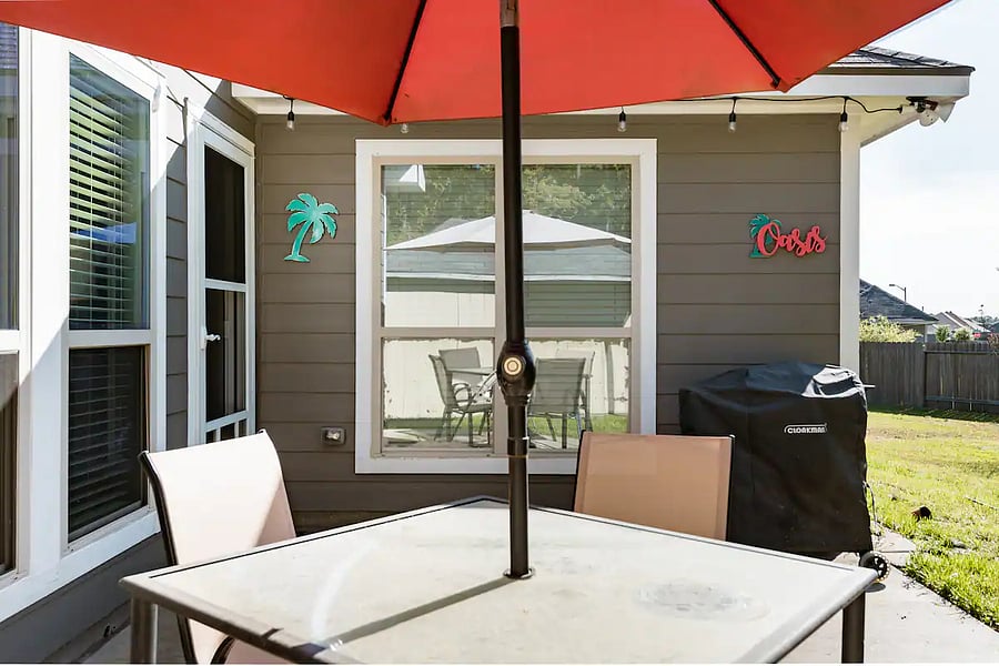     Outdoor table seating offers a simple spot to enjoy a drink or unwind.